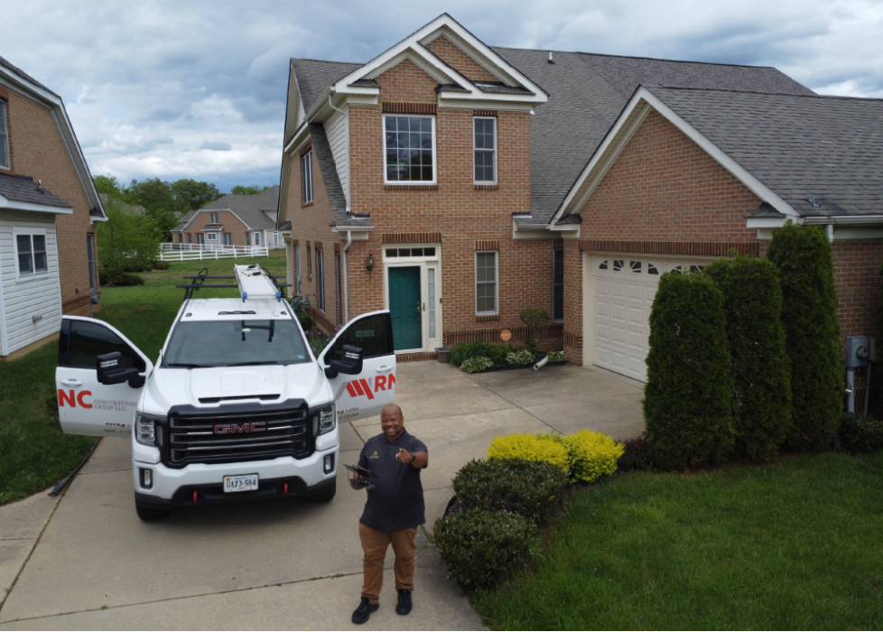 Wil the Roofer visiting a family with discontinued horizon shingles in the Heritage at Saint Charles Community in Charles County, Maryland.
